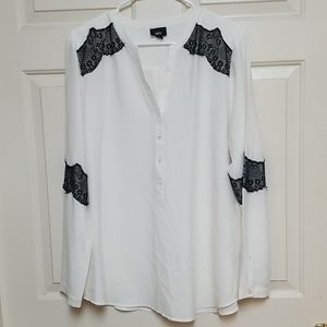 Beautiful cream blouse w/ black lace detail